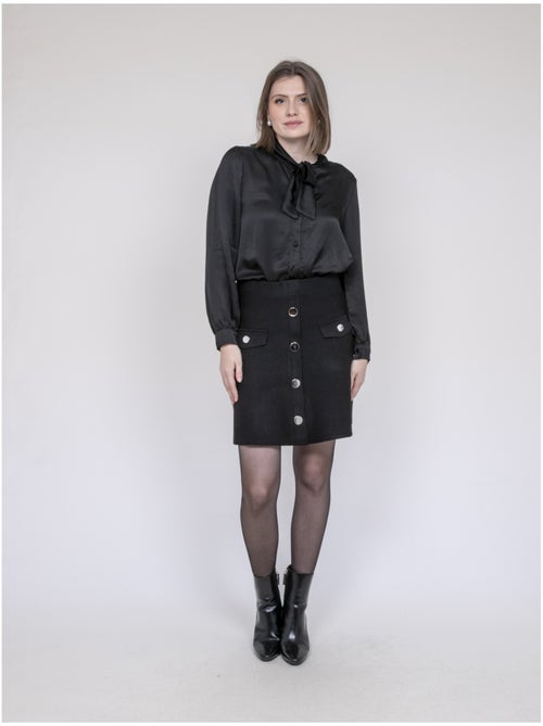 Falda de punto con botones delanteros XIVRY - Kiabi Falda de punto con botones delanteros XIVRY - Kiabi