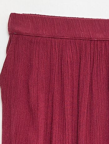 Falda acampanada ligera con estampado wax