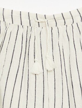 Falda larga de rayas con volantes