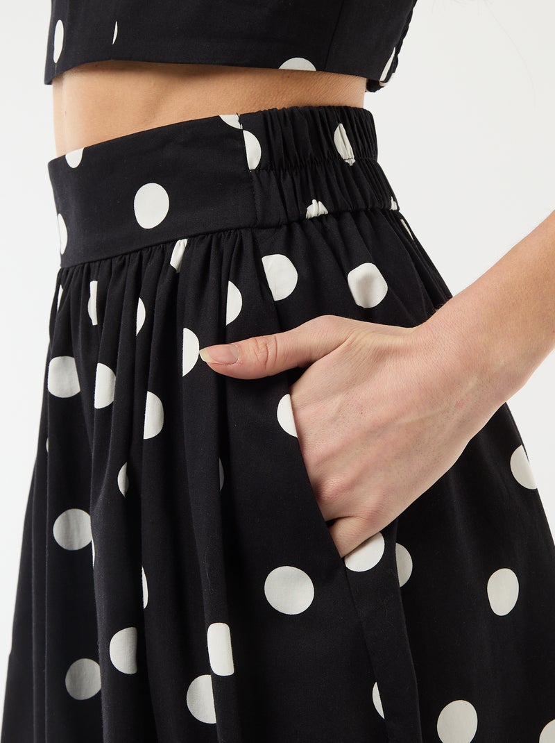 Falda midi con pinzas acampanada con estampado de lunares Negro - Kiabi