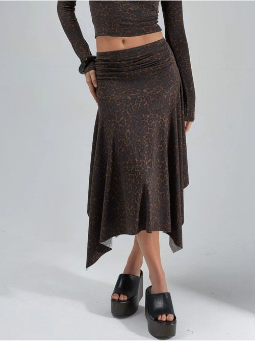Falda midi de cintura alta con estampado de leopardo y corte a busem - Kiabi Falda midi de cintura alta con estampado de leopardo y corte a busem - Kiabi