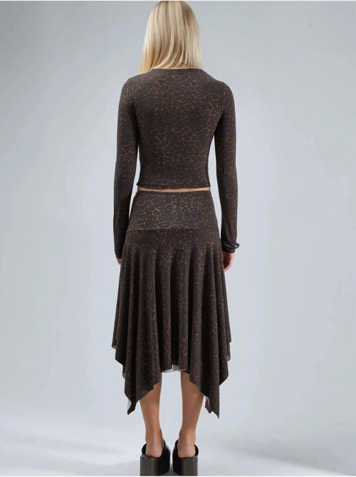 Falda midi de cintura alta con estampado de leopardo y corte a busem - Kiabi Falda midi de cintura alta con estampado de leopardo y corte a busem - Kiabi