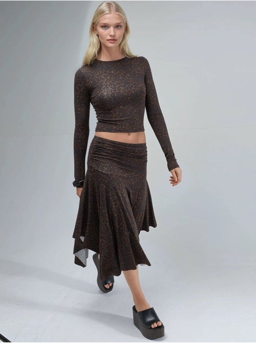 Falda midi de cintura alta con estampado de leopardo y corte a busem - Kiabi Falda midi de cintura alta con estampado de leopardo y corte a busem - Kiabi