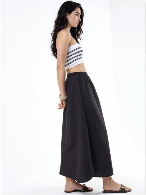 Falda midi de corte en a de talle alto busem - Kiabi Falda midi de corte en a de talle alto busem - Kiabi