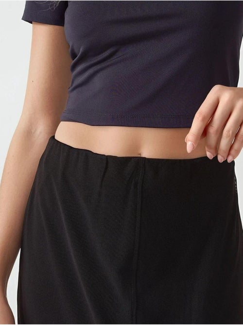 Falda midi de encaje con cintura alta de la colección pika hiccup - Kiabi Falda midi de encaje con cintura alta de la colección pika hiccup - Kiabi
