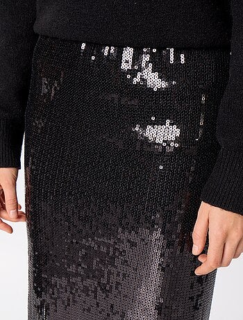 Falda midi de lentejuelas y flecos