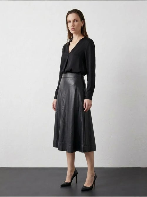 Falda midi de línea a de polipiel y tiro alto my fashion - Kiabi Falda midi de línea a de polipiel y tiro alto my fashion - Kiabi