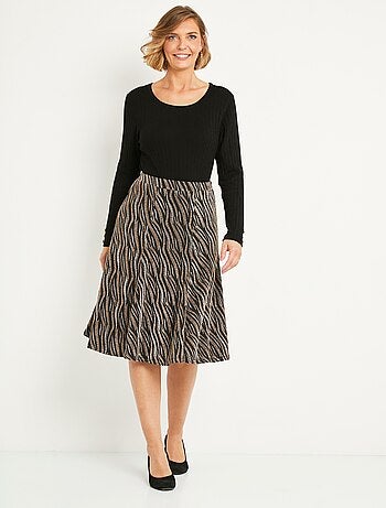 Falda midi de vuelo en punto de jacquard brillante