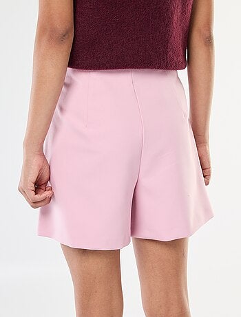 Falda pantalón asimétrica con botón dorado
