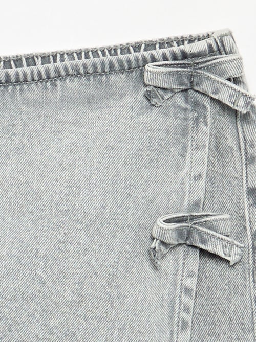 Falda pantalón corta vaquera con nudos - Kiabi Falda pantalón corta vaquera con nudos - Kiabi