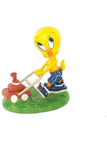 Figura piolín con cortacésped rojo sobre base de césped verde