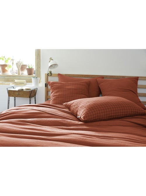 Funda de almohada – gasa de algodón tejida – cuadros pequeños - gaïa mix - Kiabi Funda de almohada – gasa de algodón tejida – cuadros pequeños - gaïa mix - Kiabi