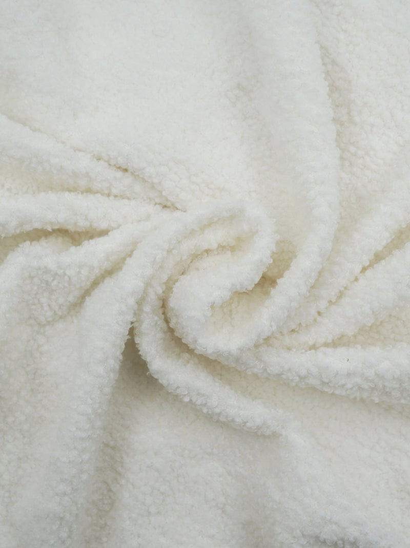 Funda de sofá extensible de rizo Beige concha - Kiabi