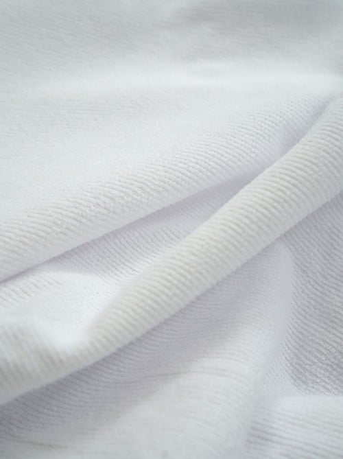 Funda impermeable con elásticos. - Kiabi