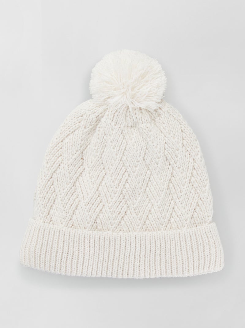 Gorro de punto trenzado con borla BEIGE - Kiabi