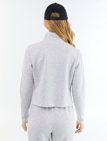 Jersey con cremallera y cuello alto