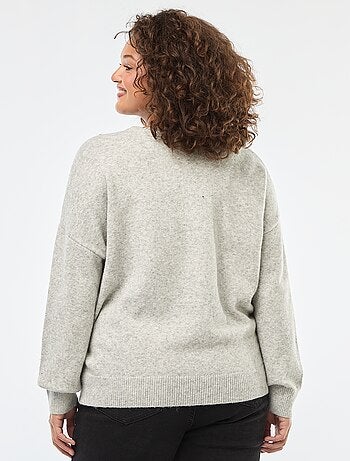 Jersey con cuello cruzado y strass de fantasía