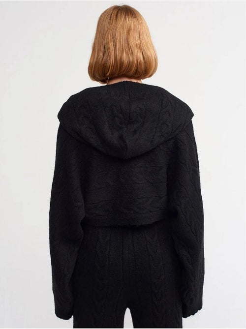 Jersey corto oversize de punto trenzado con capucha - Kiabi Jersey corto oversize de punto trenzado con capucha - Kiabi