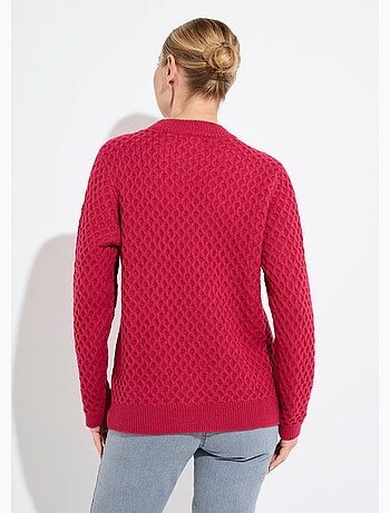 Jersey corto y cálido con cuello alto de punto grueso.