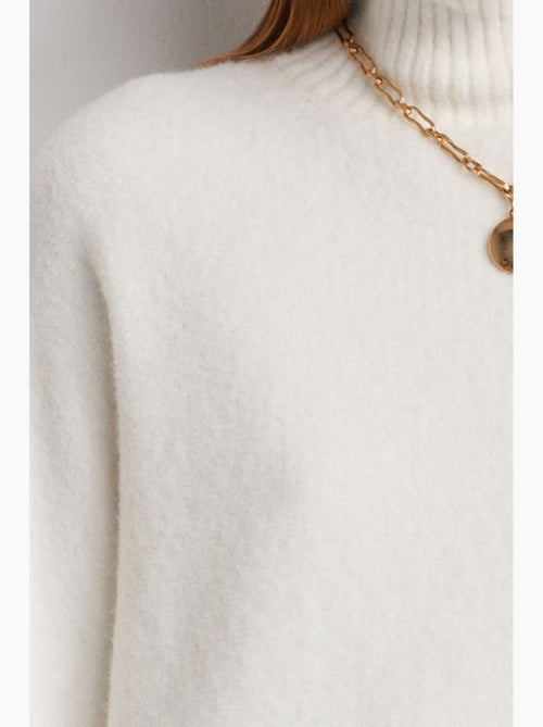 Jersey de cuello alto oversize acanalado - Kiabi Jersey de cuello alto oversize acanalado - Kiabi