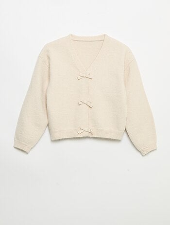 Jersey de punto con nudos decorativos