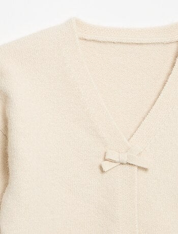 Jersey de punto con nudos decorativos