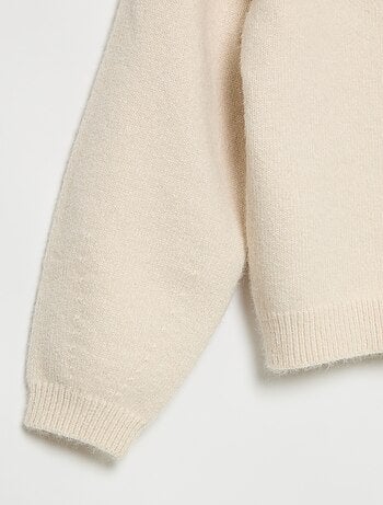 Jersey de punto con nudos decorativos