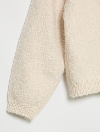 Jersey de punto con nudos decorativos