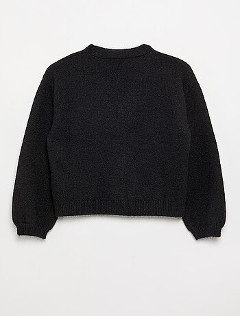Jersey de punto con nudos decorativos