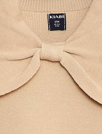 Jersey de punto con un gran lazo decorativo delante