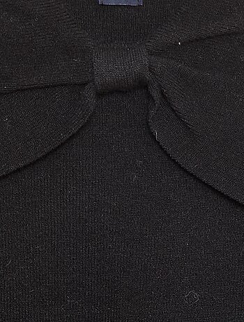 Jersey de punto con un gran lazo decorativo delante