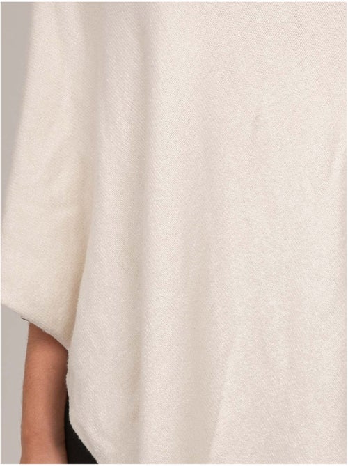 Jersey poncho asimétrico de punto fino kuvene - Kiabi Jersey poncho asimétrico de punto fino kuvene - Kiabi