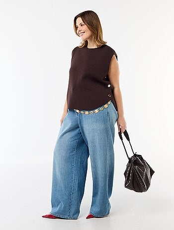 Jersey sin mangas con botones dorados en el lateral