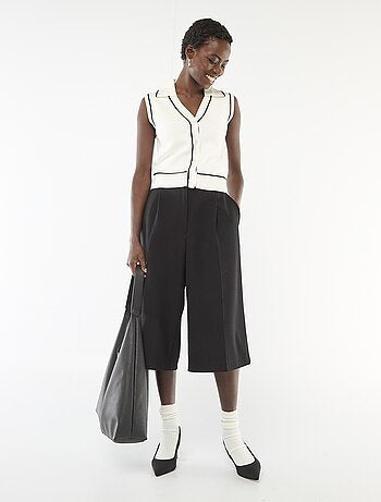 Jersey sin mangas cuello polo