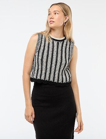 Jersey sin mangas de crochet con bajo ondulado