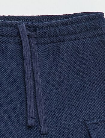 Jogging multibolsillos liso