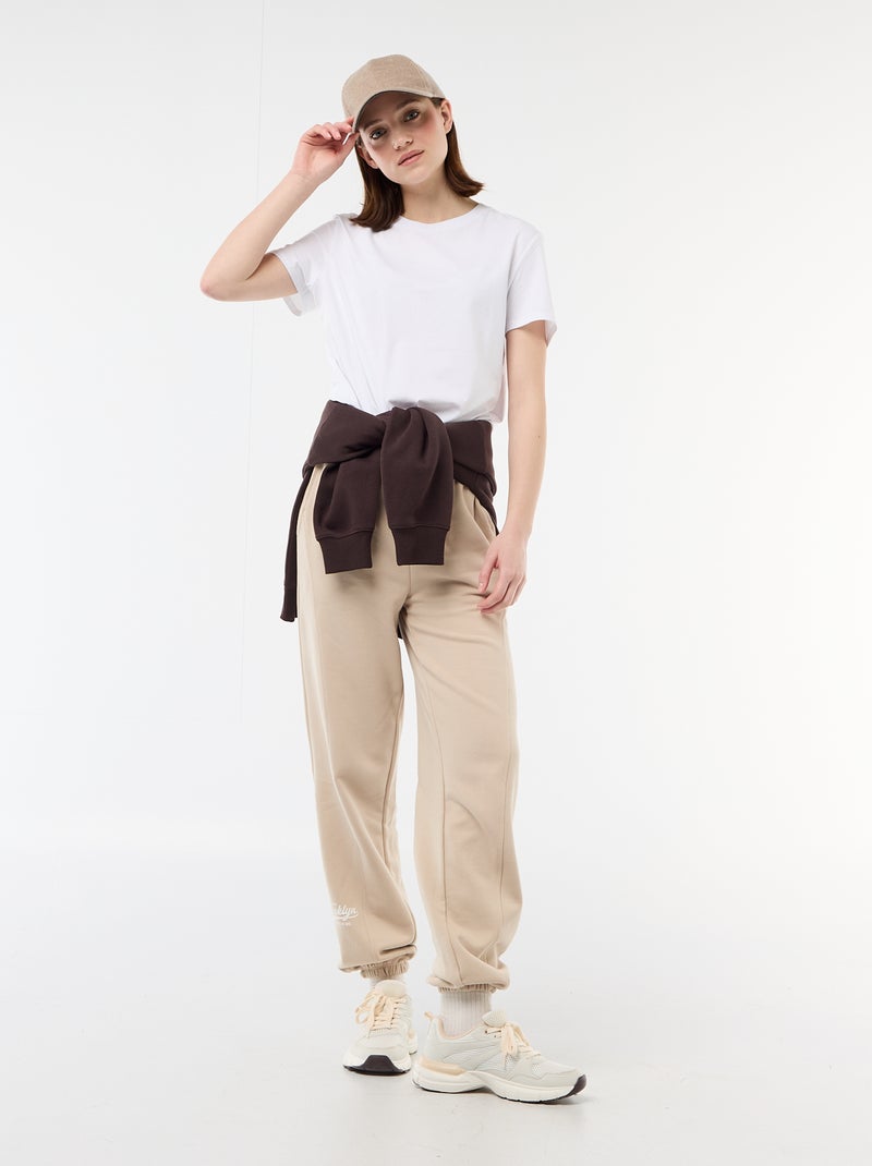 Joggers corte barrel de algodón liso Beige - Kiabi