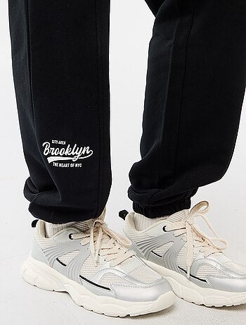 Joggers corte barrel de algodón liso