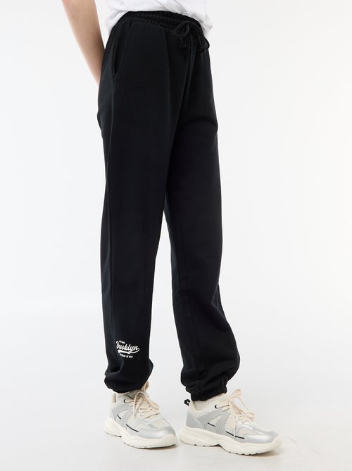 Joggers corte barrel de algodón liso - Kiabi