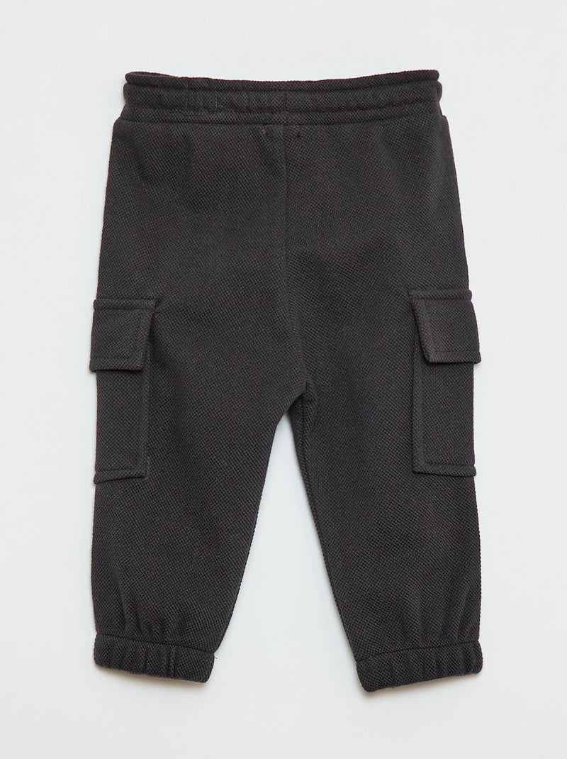Jogging multibolsillos liso Negro - Kiabi
