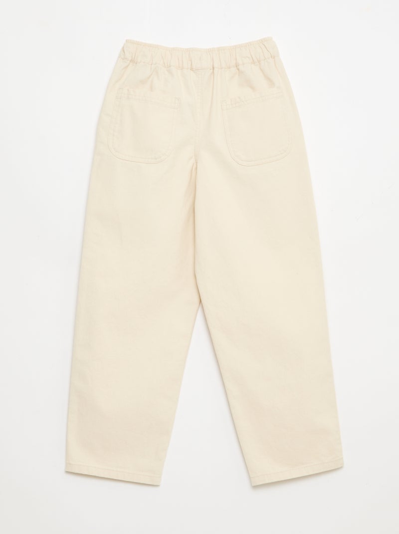Jogpant con bolsillos de parche laterales Beige - Kiabi