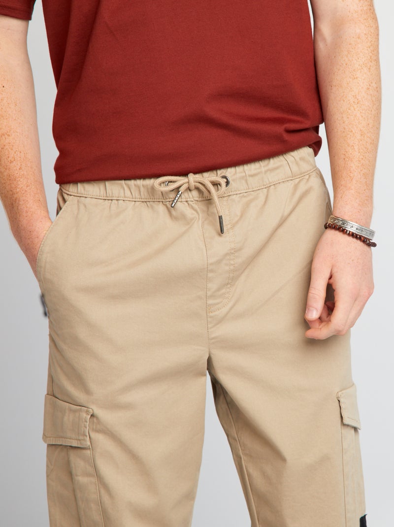 Jogpant con bolsillos de solapa BEIGE - Kiabi