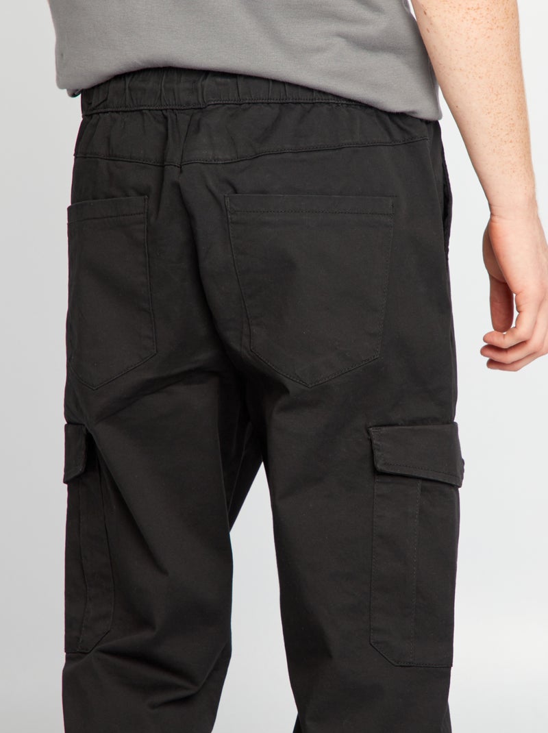 Jogpant con bolsillos de solapa negro - Kiabi