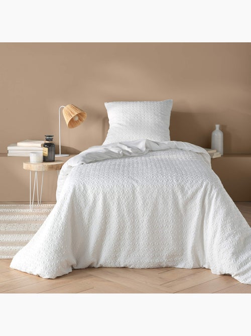 Juego de cama de 2 piezas reversible de algodón gofrado funda de cama + funda de almohada - Kiabi Juego de cama de 2 piezas reversible de algodón gofrado funda de cama + funda de almohada - Kiabi