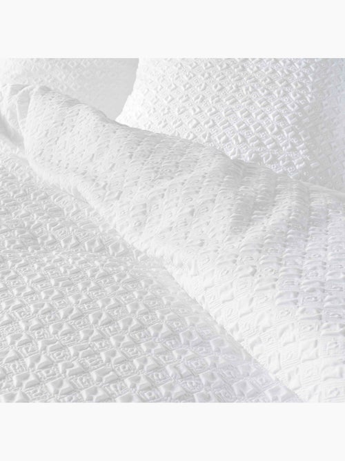 Juego de cama de 2 piezas reversible de algodón gofrado funda de cama + funda de almohada - Kiabi Juego de cama de 2 piezas reversible de algodón gofrado funda de cama + funda de almohada - Kiabi