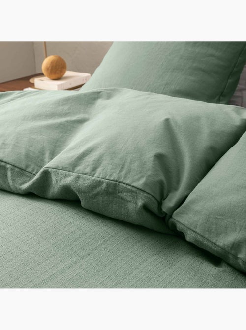 Juego de cama de 3 piezas en algodón liso en relieve + fundas de almohada - Kiabi Juego de cama de 3 piezas en algodón liso en relieve + fundas de almohada - Kiabi