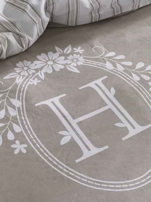 Juego de cama de 3 piezas estilo Home a rayas - Kiabi Juego de cama de 3 piezas estilo Home a rayas - Kiabi