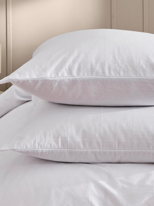Juego de cama de algodón lavado con estampado de cuadros jacquard - Kiabi Juego de cama de algodón lavado con estampado de cuadros jacquard - Kiabi