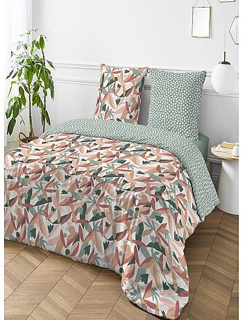 Juego de ropa de cama doble reversible con estampado abstracto.