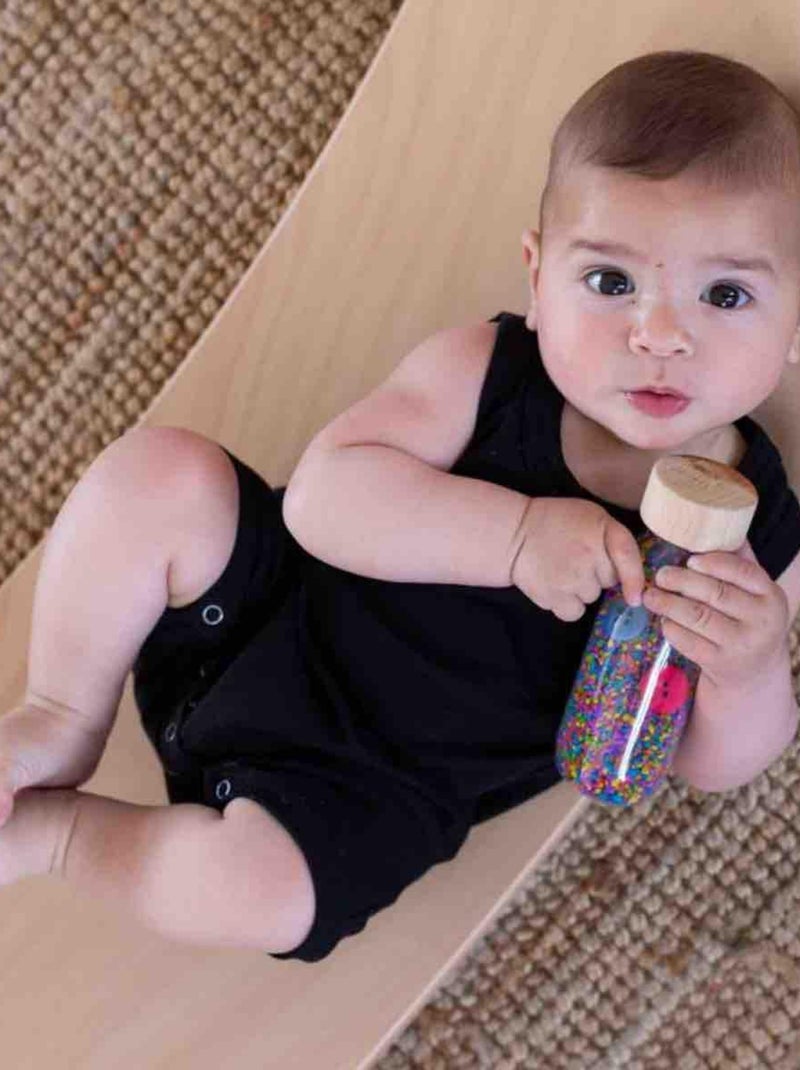 Juguete bebé botella sensorial move | Petit Boum Amarillo - Kiabi